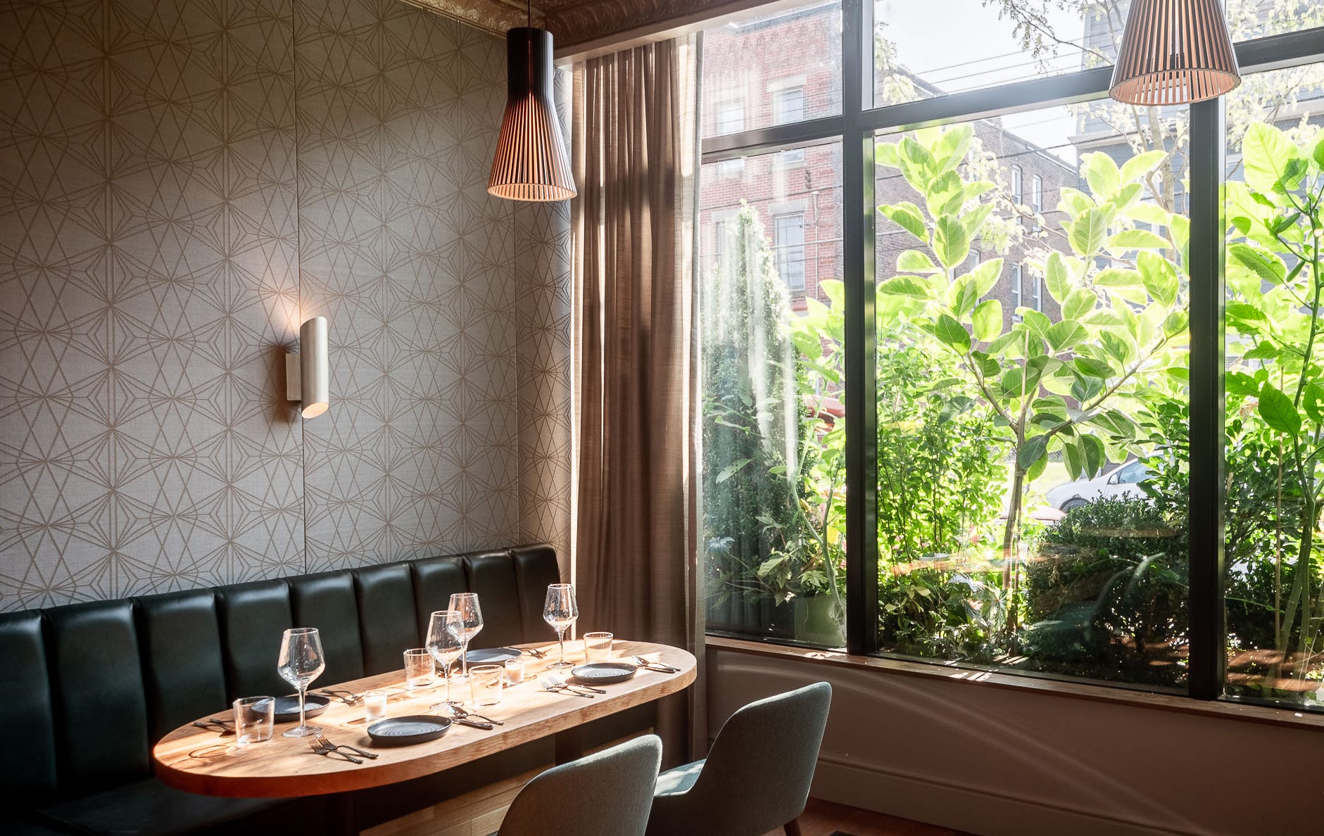Textile acoustic wall panels in a restaurant dining space