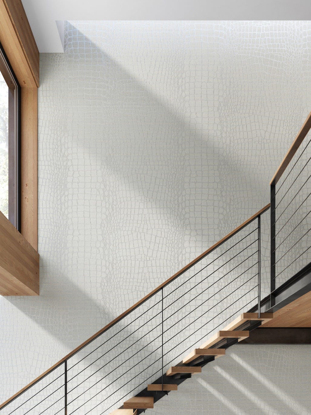 Light-filled staircase with a pale woven Xorel wall surface